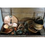 A large quantity of 19th and early 20th Century copper items including pan lids, measures, pans etc.