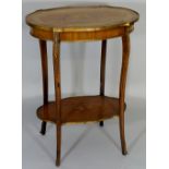 A French brass mounted floral marquetry shaped oval two tier table the top inlaid to the centre