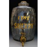 A cut glass barrel with brass tap dispenser, inscribed 'Fine Sherry' with gilt decorated glass lid,