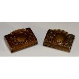 A set of two matching brass eraser boxes, spring loaded hinges and automatic flip-out erasers,