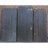 Three late 18th Century painted pine plank board doors, one 77cm x 85cm,