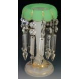 An opaline glass lustre, with upper scallop edged collar in green satin, column and base in white,