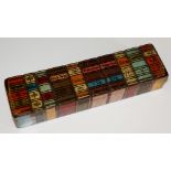 A novelty pencil box as a row of books with hinged lid, titled: Shakespeare, Milton, Byron,