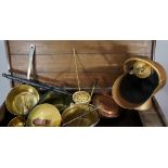 A large quantity of brass items including warming pan, coal scuttle and shovel, jam pan, etc.