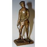 A French bronzed spelter figure of a golfer, 13.5cm high, the base marked Made In France, S.