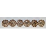 A set of six Victorian silver buttons of pierced circular design embossed with a seated female and