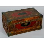 An early 19th Century leather covered cedar box decorated overall with studded bands of shaped