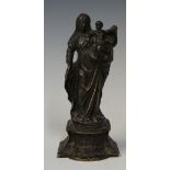 A bronze figure of Madonna and Child on acanthus cast shaped base,