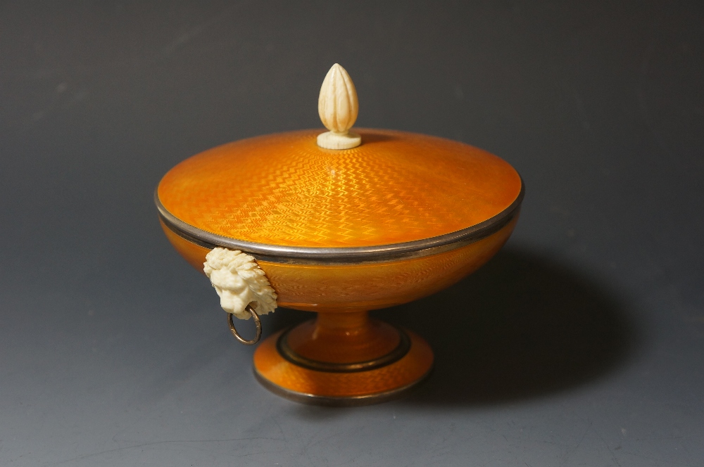 A Continental silver pedestal dish the cover and body engine turned and enamelled in a mandarin