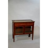 A French brass mounted mahogany bijouterie cabinet the top with hinged lid,