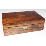 A Regency rosewood veneered writing box inlaid throughout with cut brass-work,