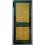 An 18th Century blue and yellow painted panelled door, 192cm high,