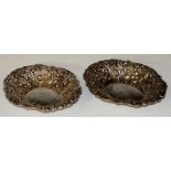 A pair of Victorian style shaped oval bon-bon dishes, embossed with flower heads,