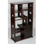 A Chinese hardwood small display stand of rectangular outline,