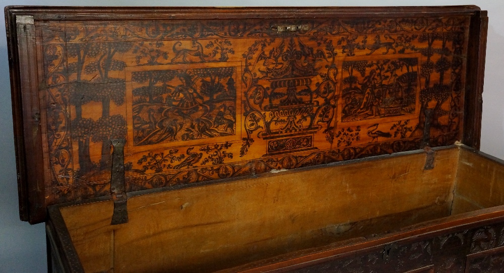 A 17th Century Italian cedar chest the plank top internally decorated in poker work with panels of - Image 2 of 2