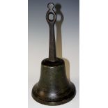 A 17th Century bronze table bell with chamfered handle with pierced terminal, iron clapper,