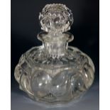 A large French cologne bottle and stopper,