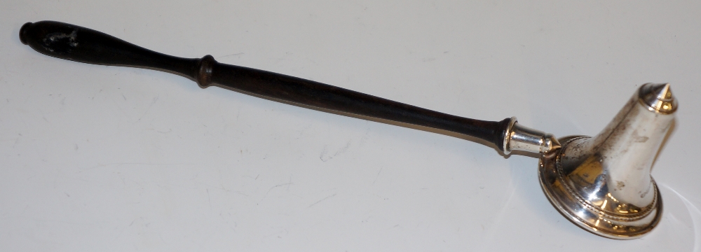 A silver candle snuffer with turned wooden handle, conical with beaded border, 28cm long by B & Co. - Image 2 of 2