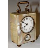 A continental mother of pearl veneered miniature carriage clock with bale and loop carrying handle