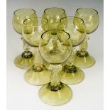 A set of six Austrian sage green glass rummers, each with high conical foot,