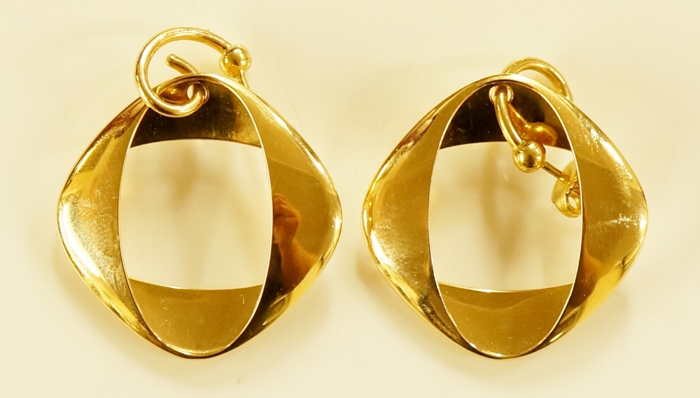 George Jensen - a pair of 18 carat gold earrings designed by Henning Koppel, numbered 1190,