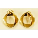 George Jensen - a pair of 18 carat gold earrings designed by Henning Koppel, numbered 1190,