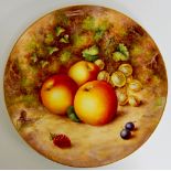 A Royal Worcester circular plate still life painted with apples, gooseberries,