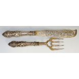 A pair of Victorian silver fish servers,