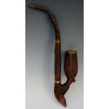 A late 19th Century pipe the terminal naively carved with a stag's head,