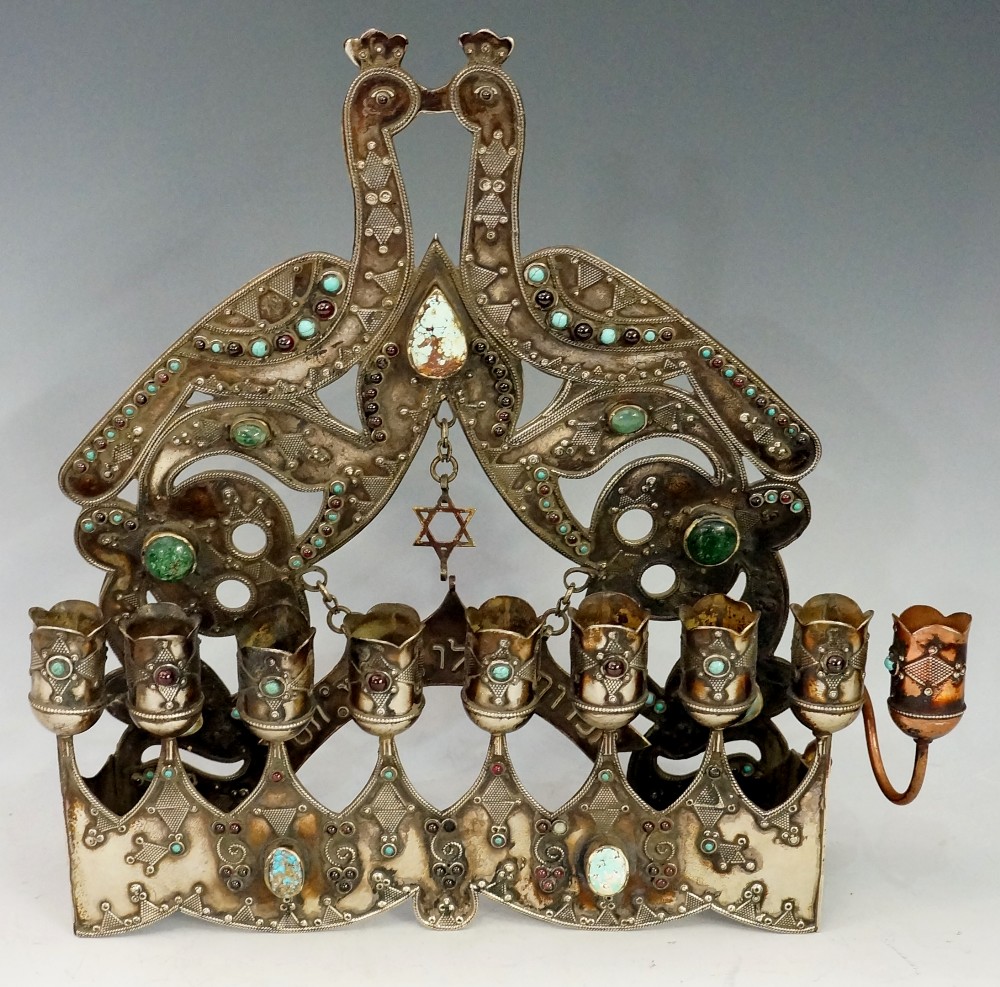 A nine branch Menorah the pierced back with stylised birds and scrolls applied turquoise, - Image 2 of 4