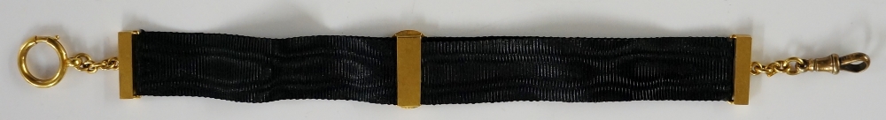 A 15ct gold and black ribbon fob chain with buckle clasp and plain rectangular tablet ends, - Image 2 of 2