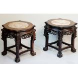 A pair of Chinese hardwood jardiniere stands,