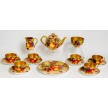 A Royal Worcester tea service comprising teapot, sucrier, cream jug,