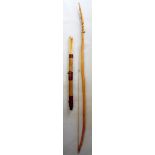 A tribal long bow,