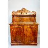 A Victorian mahogany chiffonier with shelved upstand,