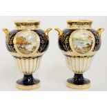 A pair of Royal Crown Derby two handled vases the ogee moulded bodies finely painted with oval