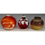 A selection of three glass vases - Schneider cameo glass vase with purple and orange flowers;