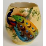 A Locke & Co. Worcester vase of urnular shape decorated with a peacock on branch by H.