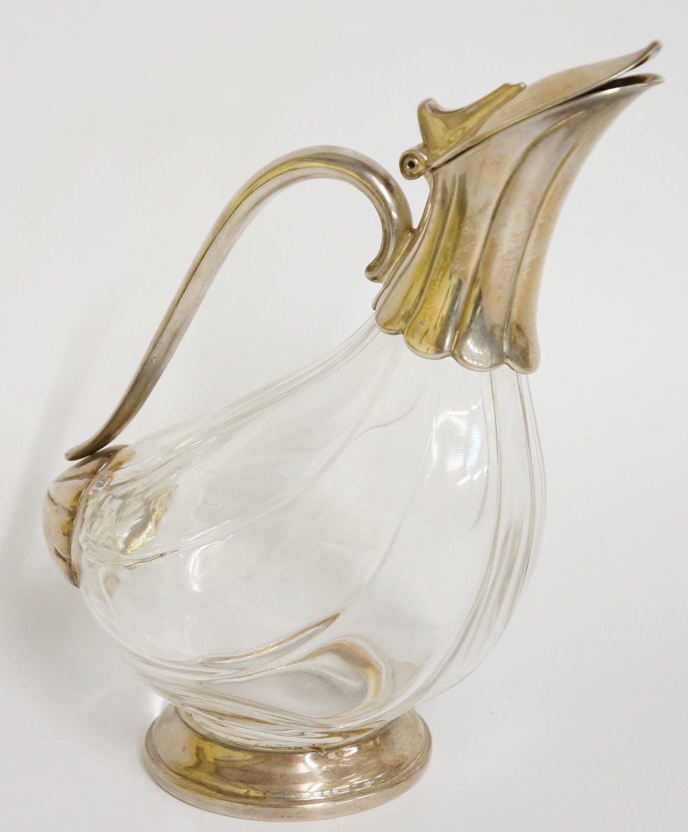 A moulded glass claret jug with silver plated mounts, - Image 2 of 2