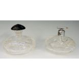 A matched pair of Art Deco cut glass scent bottles, one with atomiser,