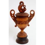 An Indian sandalwood two handled goblet shaped cup and cover,