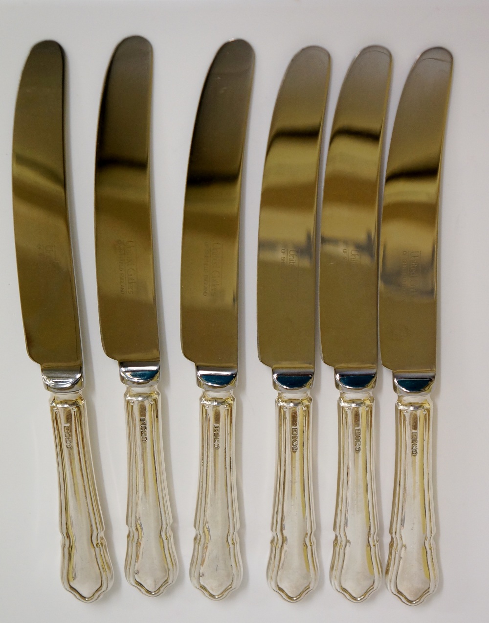 A set of six Dubarry pattern silver handled tea knives, marked Sheffield 1993 United Cutlers,