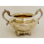 A Victorian large parcel-gilt sugar basin, shaped circular with S-scroll handles,