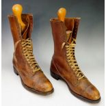 A good pair of Edwardian leather boots, calf length, including a pair of shoe trees,