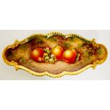 A Royal Worcester shaped oval dish with gilt gadrooned rim,