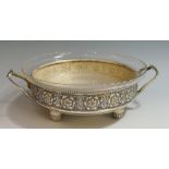 A WMF silver plated embossed basket and inset glass dish with frosted base and partially scalloped