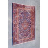 A Persian Kashan rug,