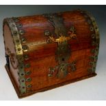 An oak domed topped box applied coppered white metal strap work mounts,