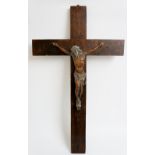 A 19th Century bronze corpus of Christ on an oak crucifix, corpus 34cm high,