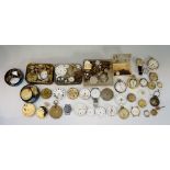 A selection of pocket watches, wrist watches and a large quantity of watch parts for both,